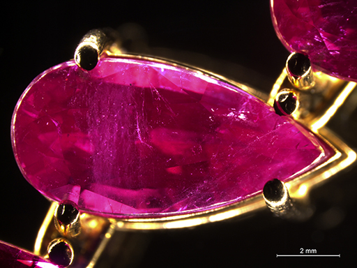 Grown synthetic rubies exhibiting rather atypical fingerprint and cloud-like inclusions