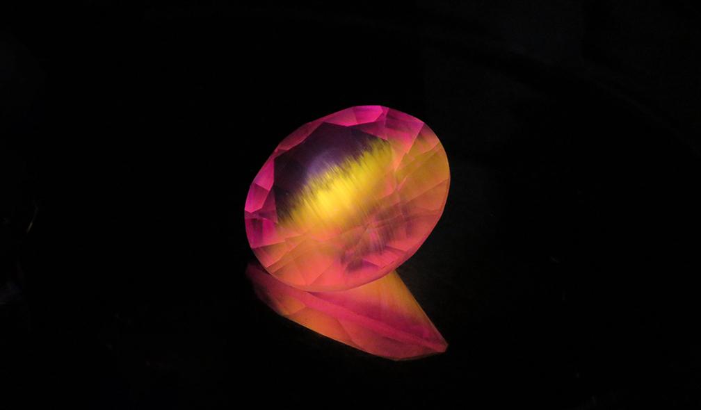 Amazing synthetic flame-fusion synthetic colour-change sapphire seen under laser excitation
